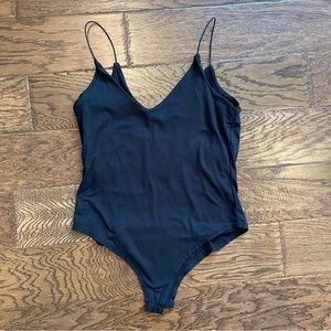 Black spaghetti strap body suit *one snap missing at bottom but still closes*